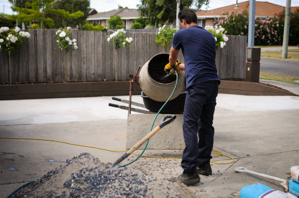 Driveway being cemented at domestic residence by home owner in DIY project.